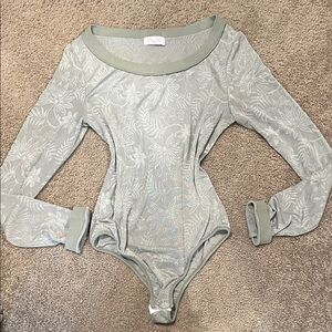 Pink Lily Subtle Floral Bodysuit in Soft Green